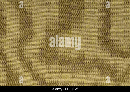 close up of a ocher knitted background pattern, knitted right and left, detail, macro, full frame,  blank, empty Stock Photo