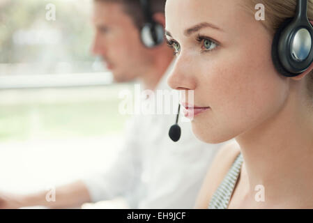 Woman working in call center Stock Photo