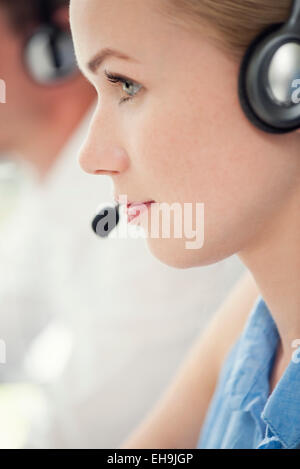 Woman working in call center Stock Photo