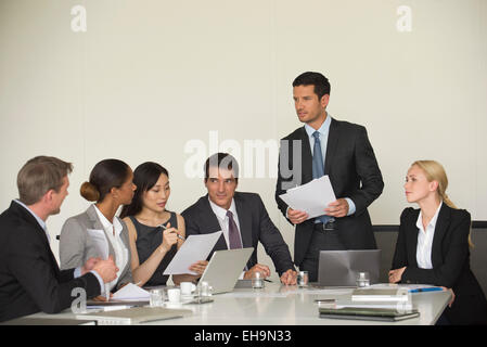 Executive giving presentation in meeting Stock Photo - Alamy