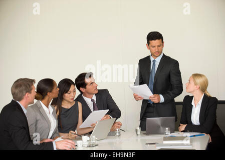 Executive giving a presentation in the meeting room Stock Photo - Alamy