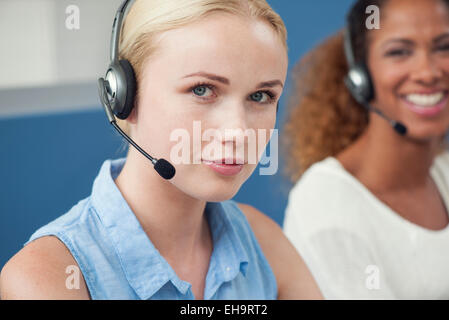 Women working in call center Stock Photo