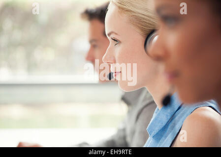 Woman working in call center Stock Photo