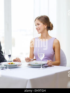 young woman looking at husband or boyfriend Stock Photo