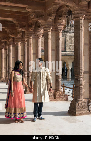 Young Indian Couple Visits Diwan-i-Am (Public Audience Hall) at Amber Palace (Amer Fort), Jaipur, Rajasthan, India Stock Photo