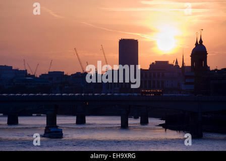 London 20 Aug 2013 : The River Thames at sunset view from Tower Bridge looking towards The City Stock Photo