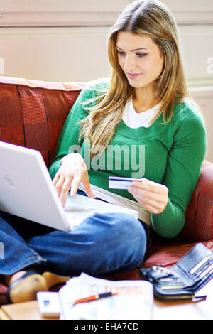 Girl shopping online Stock Photo