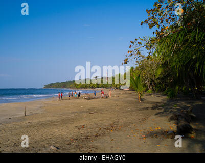 The sun sets at the beach at Manzanillo, Limon, Costa Rica. Stock Photo