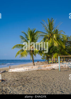 The sun sets at the beach at Manzanillo, Limon, Costa Rica. Stock Photo