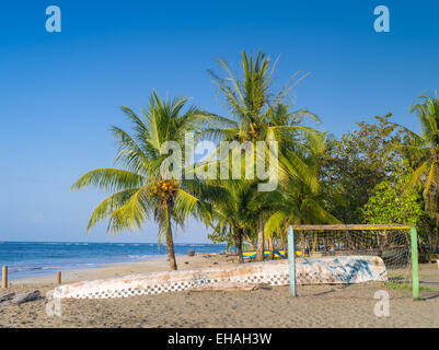 The sun sets at the beach at Manzanillo, Limon, Costa Rica. Stock Photo