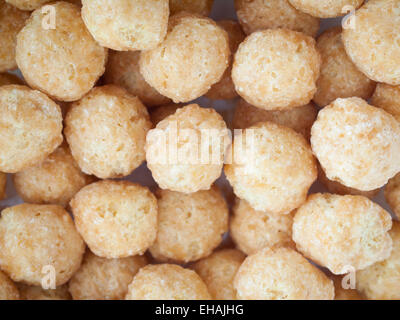 A close-up of Kellogg's Corn Pops cereal.  Canadian version shown. Stock Photo