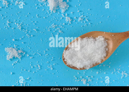 sea salt in swooden spoon Stock Photo