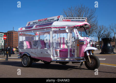 Custom-made Pink THAI-STYLE tuk tuks, electric, electric vehicles, electric motor, EV, electric car ownership auto-rickshaws in Liverpool, Merseyside, Stock Photo