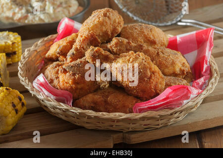 Southern fried chicken with coleslaw and grilled corn Stock Photo