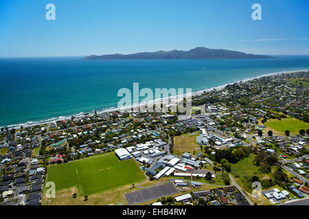 Kapiti College, Raumati Beach, and Kapiti Island, Kapiti Coast, Wellington region, North Island, New Zealand - aerial Stock Photo