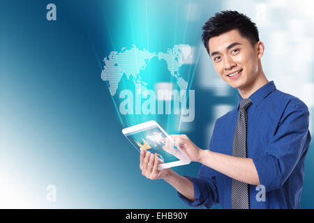 Business man holding a tablet model Stock Photo