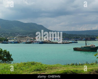 View to Puerto Plata port with moored fishing boats Dominican Republic located in San Felipe de Puerto Plata main northern port cargo operations Stock Photo