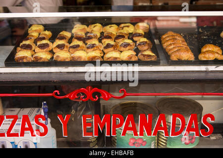 Argentina, Buenos Aires, San Telmo indoor produce market, sweet, pastries on display in cafe Stock Photo