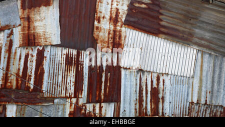 abstract old rusty galvanized and corrugated steel panel Stock Photo