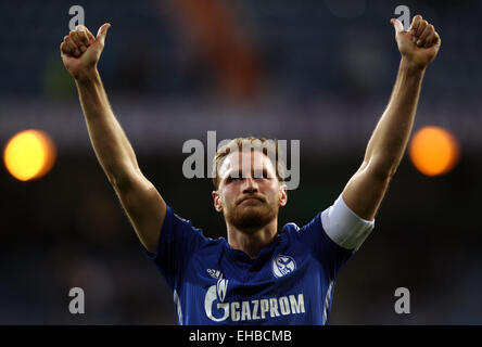 Madrid, Spain. 10th Mar, 2015. Schalke's Benedikt Hoewedes reacts after the UEFA Champions League Round of 16 second leg soccer match at Santiago Bernabeu Stadium in Madrid, Spain, 10 March 2015. Photo: Ina Fassbender/dpa/Alamy Live News Stock Photo