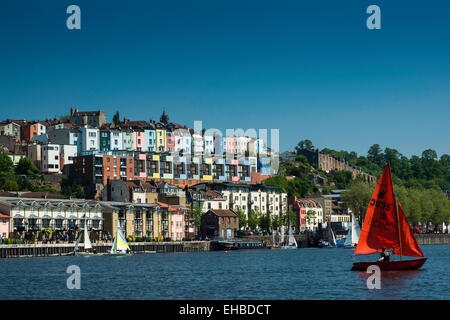 View across River Avon towards riverside apartments in Bristol with sailing boat Stock Photo