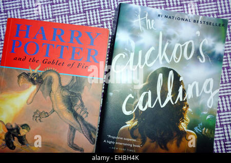 The Cuckoo's Calling and a book from the Harry Potter series, both books by the author JK Rowling. Stock Photo