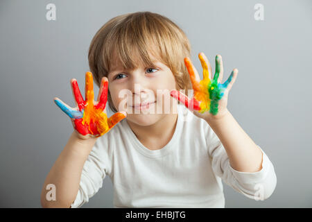 hands painted  in colorful paints Stock Photo