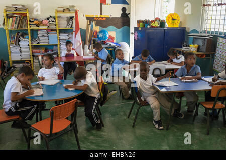 Primary school children studying in a classroom of village school near Puerto Plata, Dominican Republic, Caribbean Islands Stock Photo