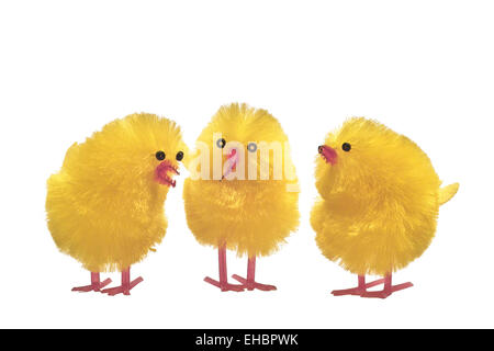 Three yellow chick made of fabric next to each oth Stock Photo