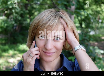 Woman on the phone Stock Photo