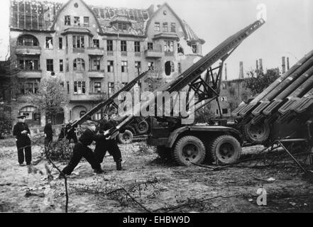 SOVIET KATYUSHA (Stalin's Organ) rocket launchers being loaded in suburbs of Berlin in April 1945 Stock Photo