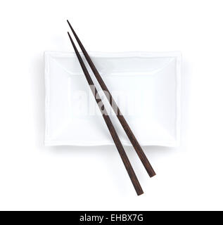 Empty plate and chopsticks. Isolated on white background Stock Photo