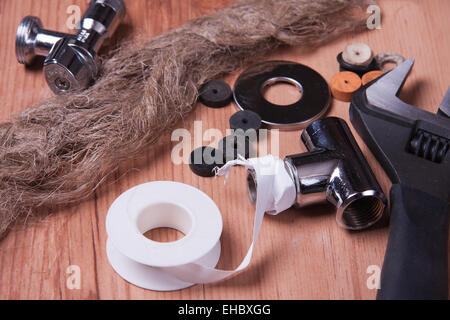 Professional plumbing tools and seals placed in the workplace. Stock Photo