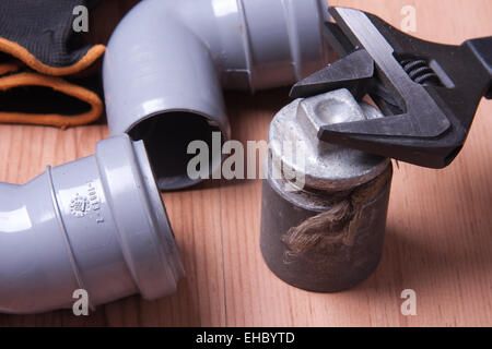 Professional plumbing tools and seals placed in the workplace. Stock Photo