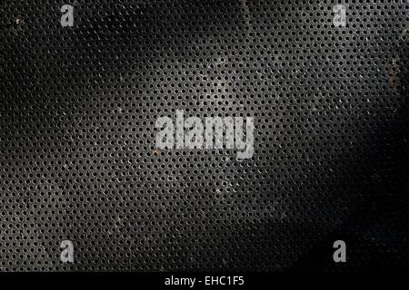 metal texture with round holes honeycomb pattern Stock Photo
