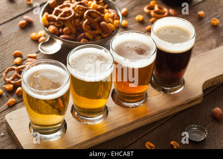 Assorted Beers in a Flight Ready for Tasting Stock Photo