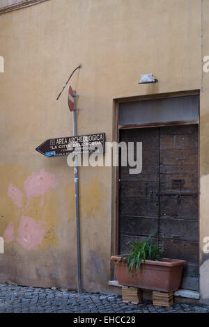 Via Vicolo Del Babuccio, a road in downtown Rome Italy. Archaeological site. Stock Photo