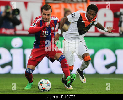 Munich, Germany. 11th Mar, 2015. Bayern Munich's Mario Goetze (L) breaks through during the UEFA Champions League Round of 16 second leg match against Shakhtar Donetsk in Munich, Germany, on March 11, 2015. Bayern Munich won 7-0. Credit:  Philippe Ruiz/Xinhua/Alamy Live News Stock Photo