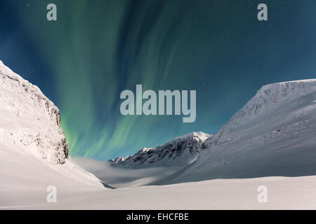 Northern lights seen at Nallostugan wilderness hut, Kebnekaise mountain area, Kiruna, Sweden, Europe, EU Stock Photo