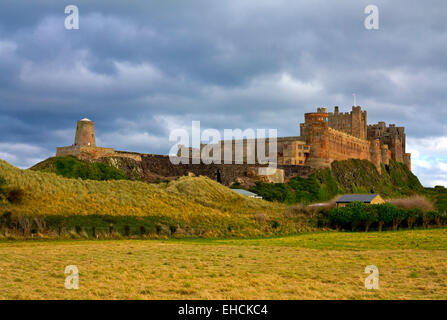 View from below of Bamburgh Castle in Northumberland England UK home of the Armstrong family Stock Photo