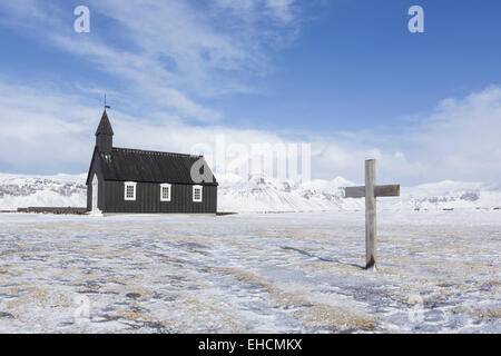 There has been a church here since 1703. When the importance of Buðir as a trading post declined, the hamlet was declared to no longer be a parish. A replacement church was needed, but not forthcoming from the church. One woman fought and won the King’s permission to build a new church… Steinunn Lárusdóttir. When her church was completed in 1848, a plaque claimed the Buðir black church was build without the help of the “Fathers”, in other words, without any help from the Lutheran Church. The church which stands there now is a reconstruction of Steinunn Lárusdóttir’s church. And it serves as a  Stock Photo