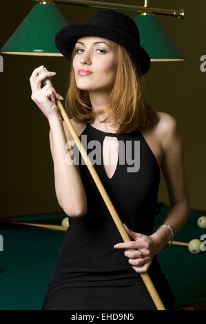 blonde with cue Stock Photo