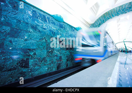 Moving train on underground station Stock Photo