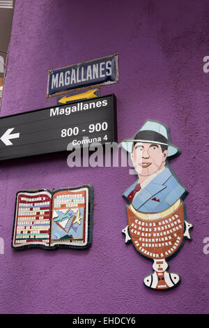 Argentina, Buenos Aires, La Boca, Magallenes, tiled mosaic memorials on wall below street name Stock Photo