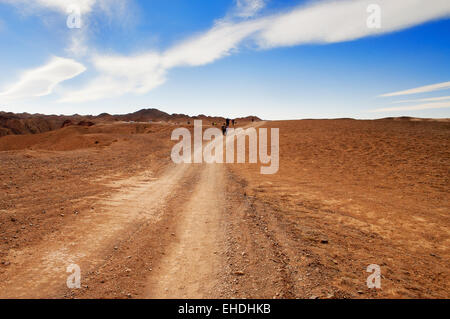 Road through the desert to Charyn canyon in Kazakhstan Stock Photo