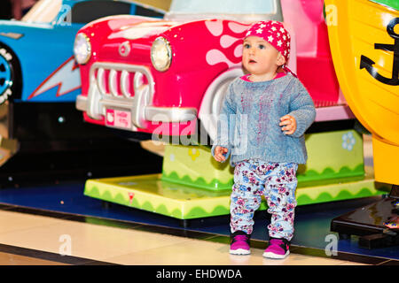 A pretty little girl with red bandana having fun Stock Photo