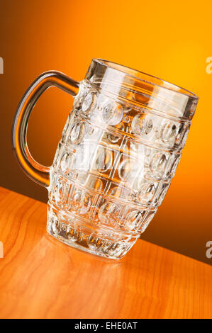 Beer glass against gradient background Stock Photo