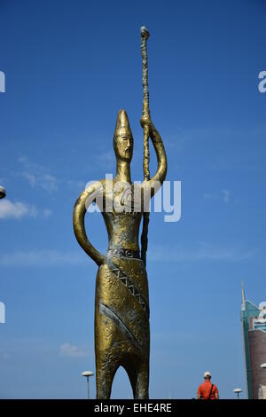 Bronze statue in abstract style featuring a nomad warrior holding a spear - in Astana, Kazakhstan Stock Photo