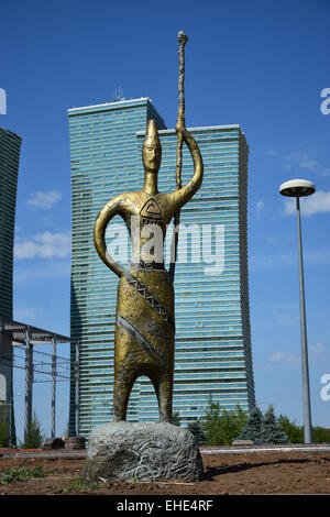 Bronze statue in abstract style featuring a nomad warrior holding a spear - in Astana, Kazakhstan Stock Photo