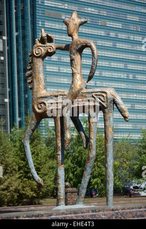 Bronze statue in abstract style featuring a rider on horseback - in the street of Astana, Kazakhstan Stock Photo